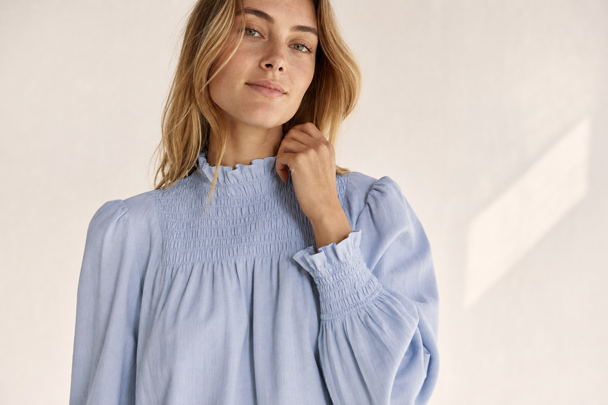 Blus Med Smock dam